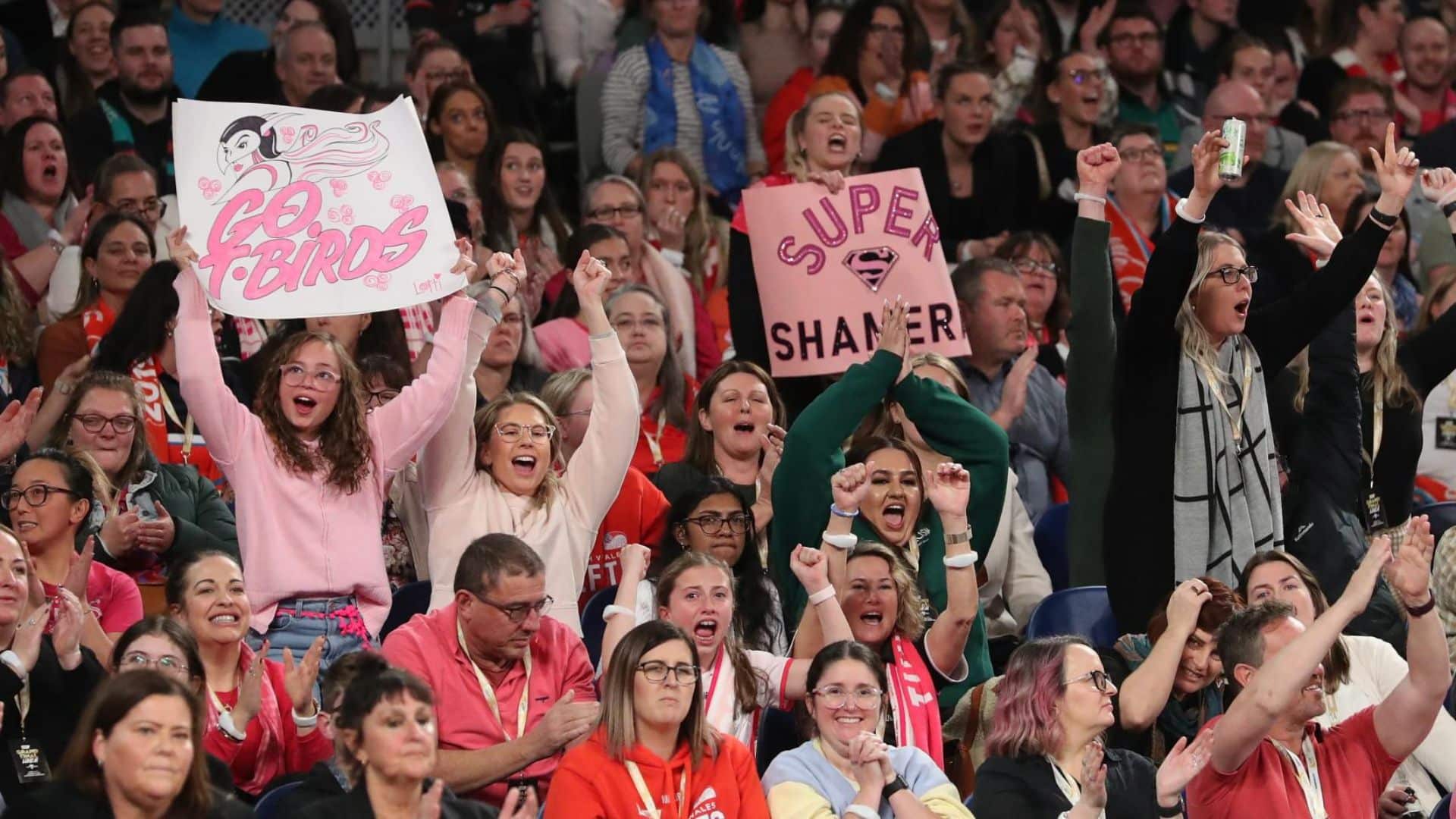 Super Netball fans cheering on the T-Birds